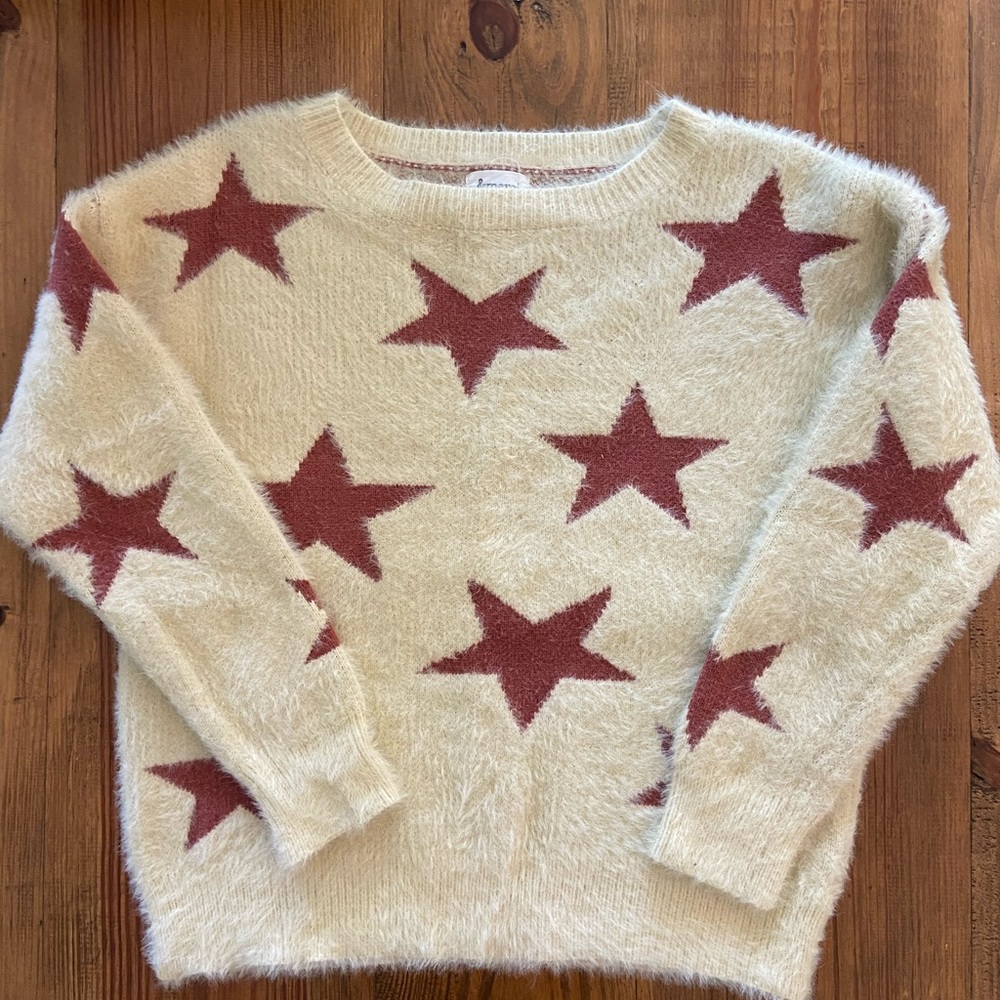 &Merci star sweater bought from a boutique. Runs slim and short. Good condition